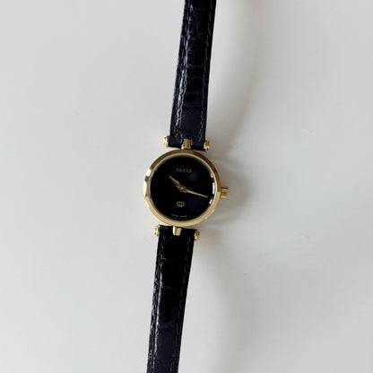 Gucci 1980s Black Dial Round Gold-Plated Watch