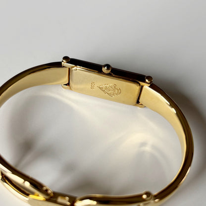 Gucci 1990s Gold Rectangular Dial Gold Plated Bangle Watch