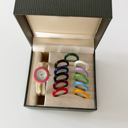 Gucci 1990s Interchangeable Bezel Gold Plated Bangle Watch with 12 bezels, case