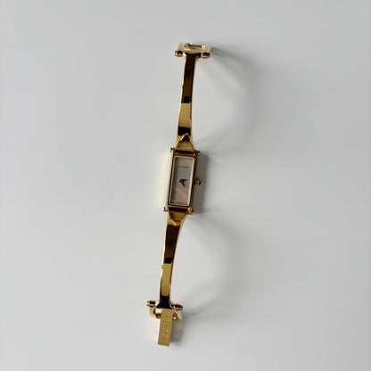 Gucci 1990s Seashell Rectangular Dial Gold Plated Bangle Watch