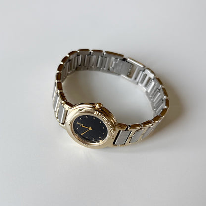 Yves Saint Laurent 1990s Black Round Dial Two Tone Gold Plated Watch