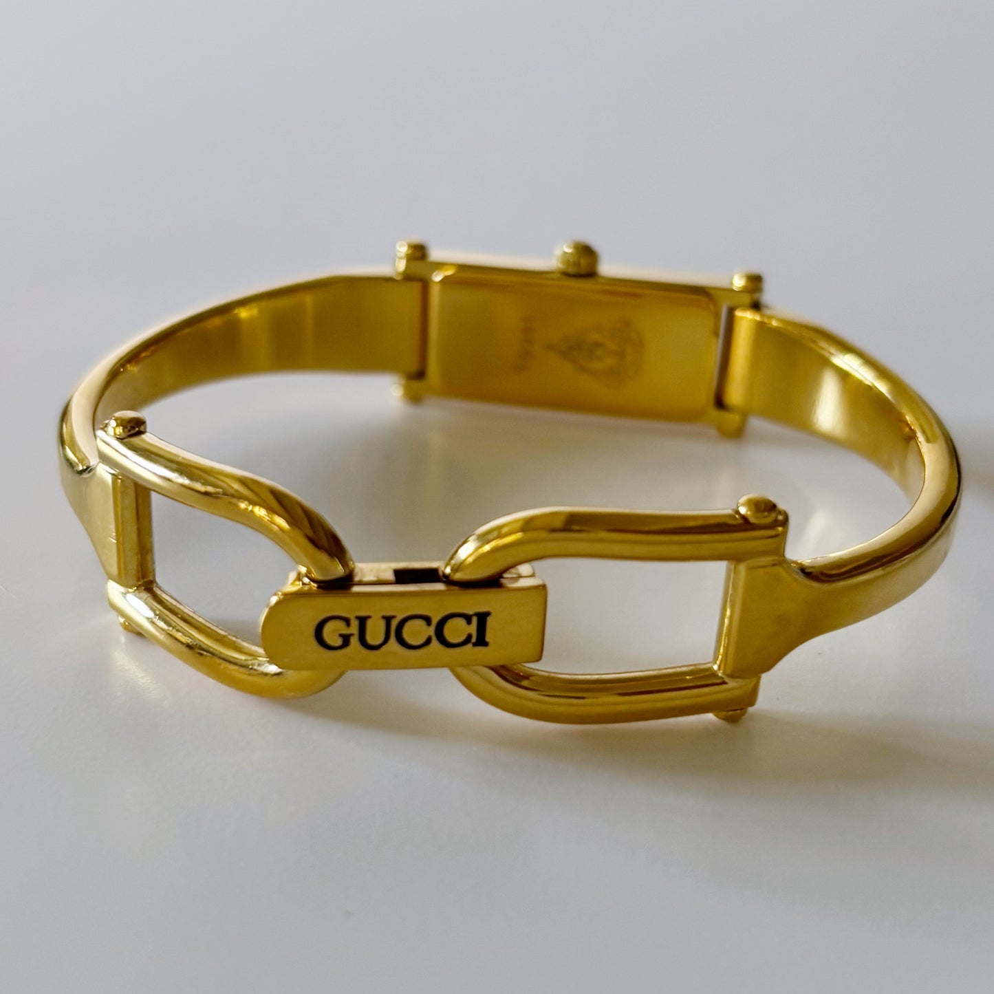 Gucci 1990s Rectangular Seashell Dial Gold Plated Bangle Watch