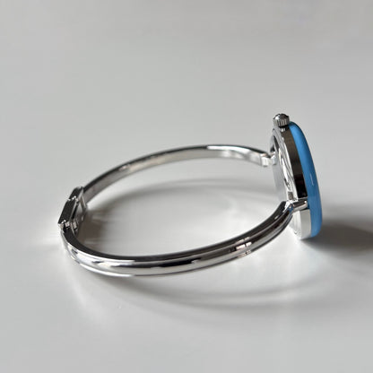 Gucci 1990s Interchangeable Bezel Silver Stainless steel Bangle Watch with 12 bezels, case