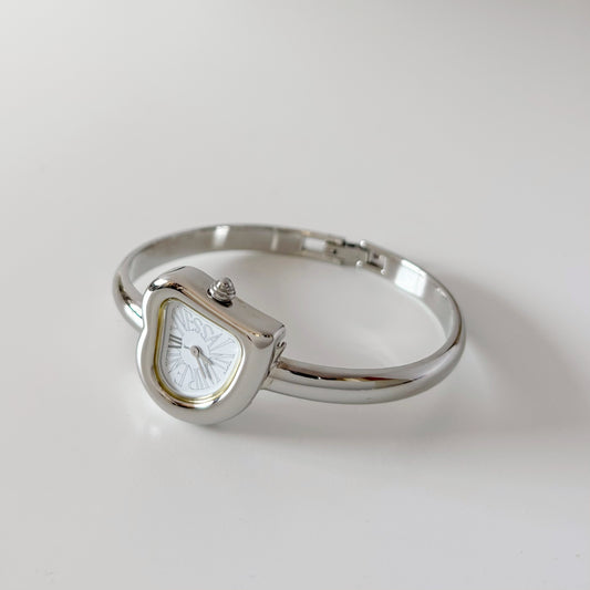 Yves Saint Laurent 1990s Heart Shaped Silver Bangle Watch