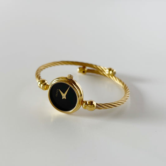 Gucci 1990s Black Dial Gold Plated Cable Bangle Watch