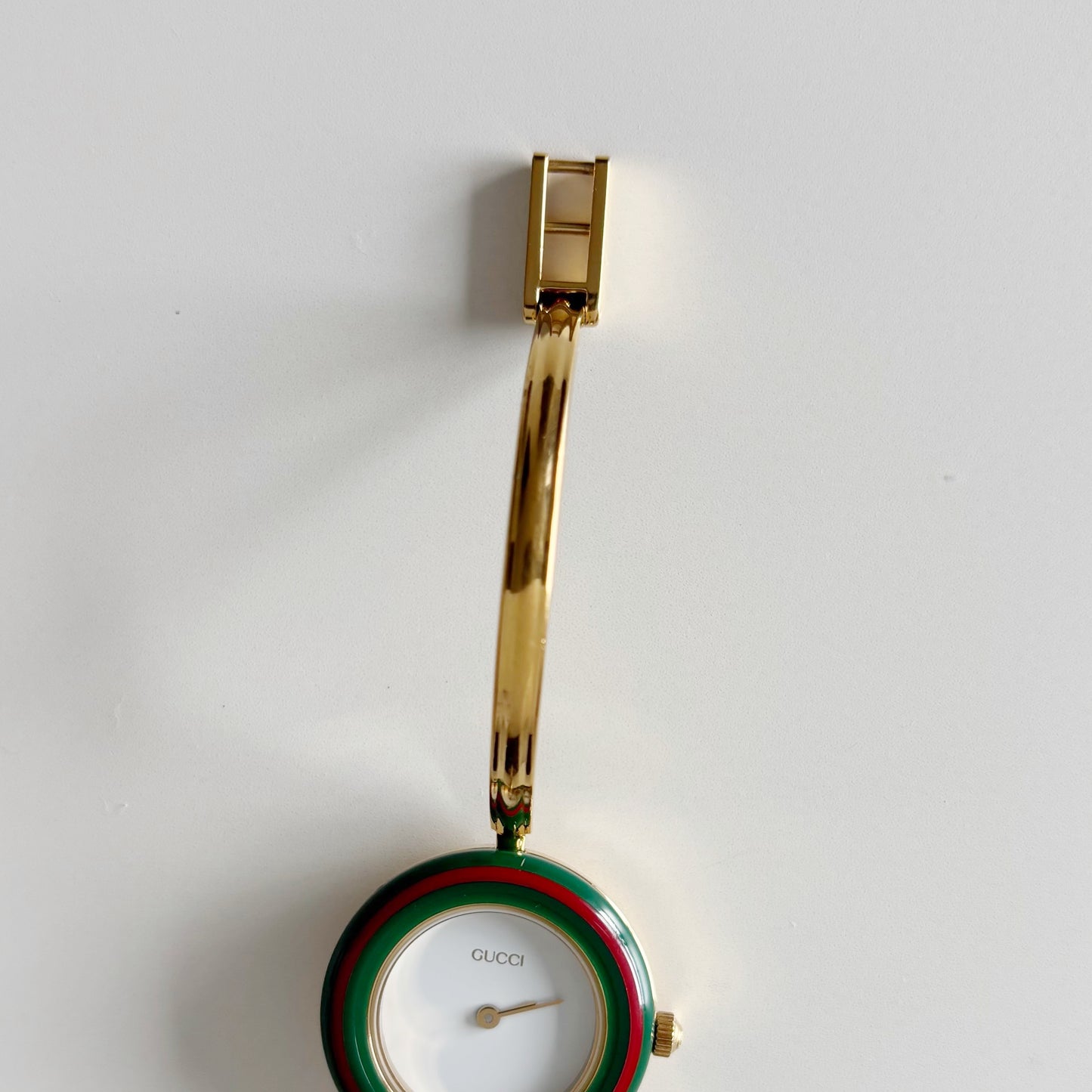 Gucci 1990s Interchangeable Bezel Gold Plated Bangle Watch with 12 bezels, case (Small)