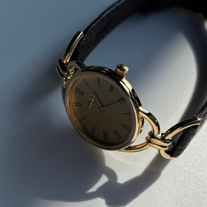 Gucci 1990s Gold Round Dial Horsebit Gold Plated Watch