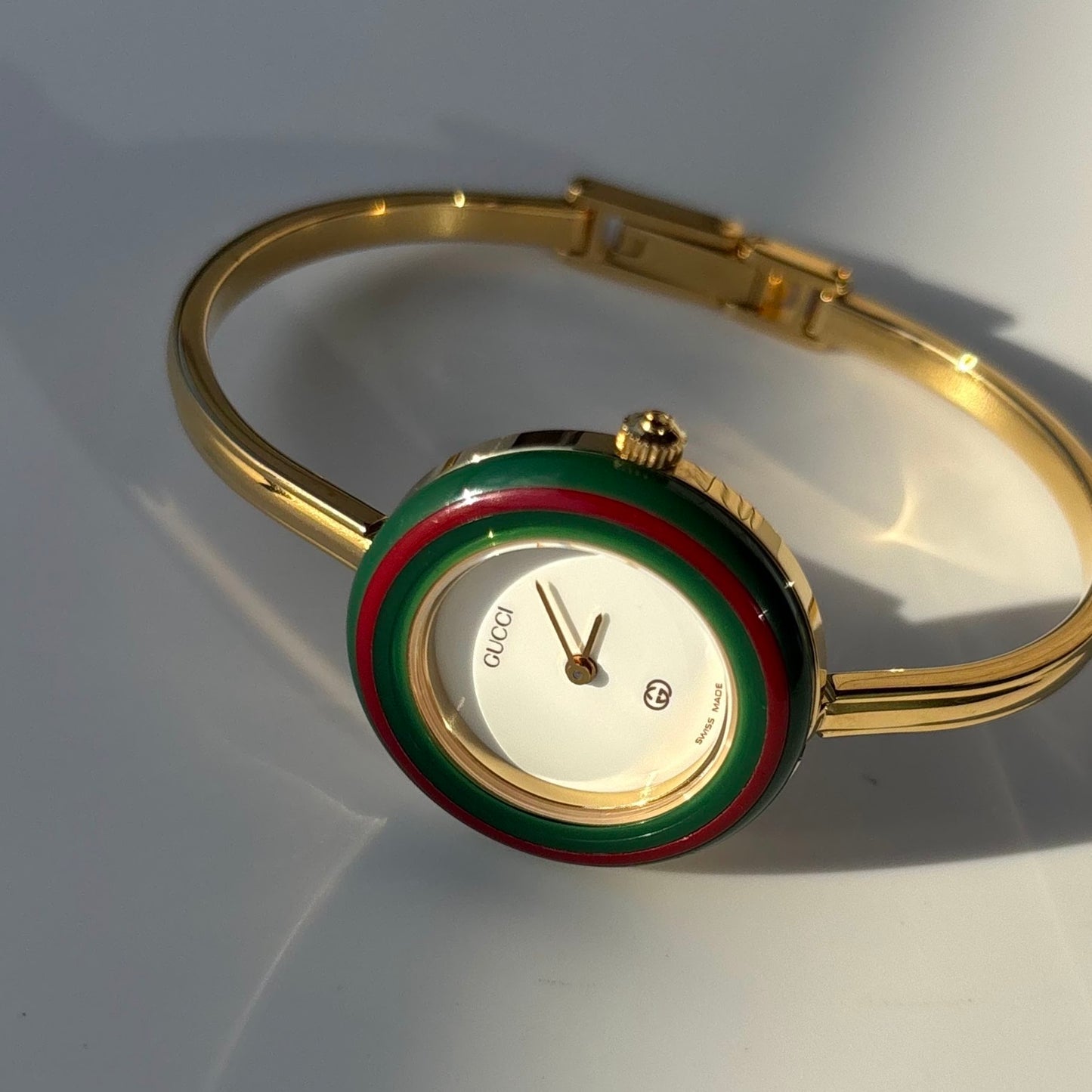 Gucci 1990s Interchangeable Bezel Gold Plated Bangle Watch with 12 bezels, case