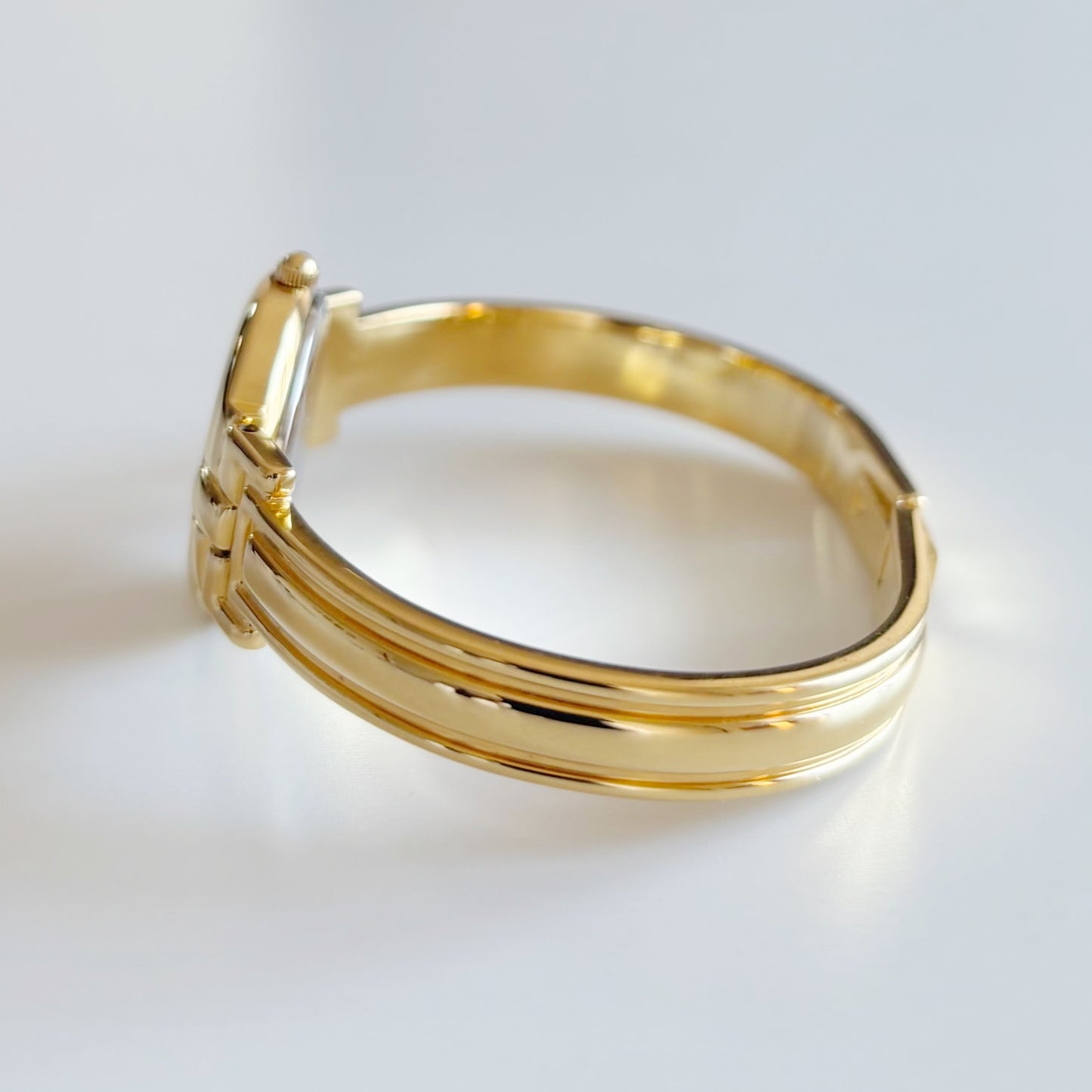 Givenchy 1990s Navy Round Dial Gold Plated Bangle Watch