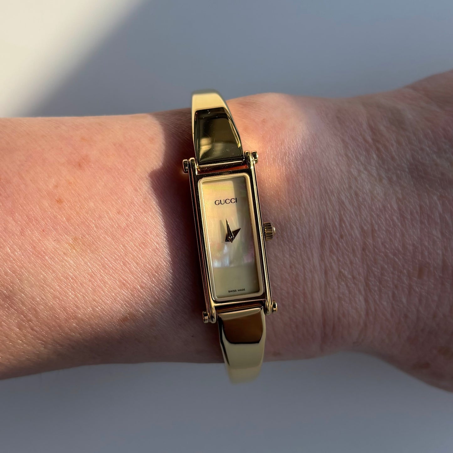 Gucci 1990s Seashell Rectangular Dial Gold Plated Bangle Watch