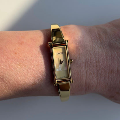 Gucci 1990s Seashell Rectangular Dial Gold Plated Bangle Watch