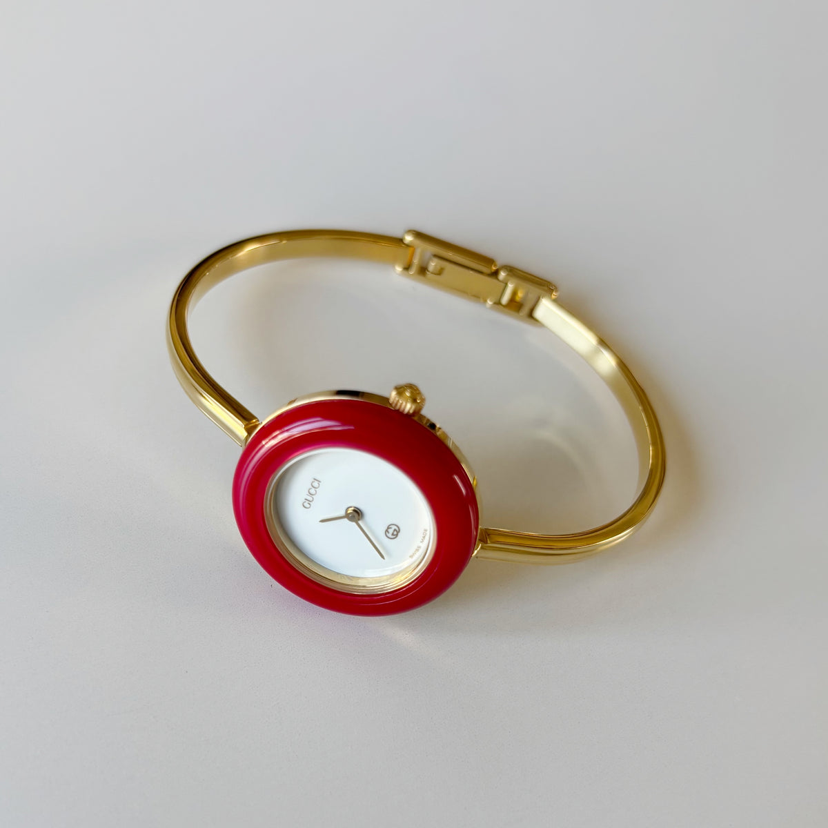 Gucci 1990s Interchangeable Bezel Gold Plated Bangle Watch with 12 bezels, case