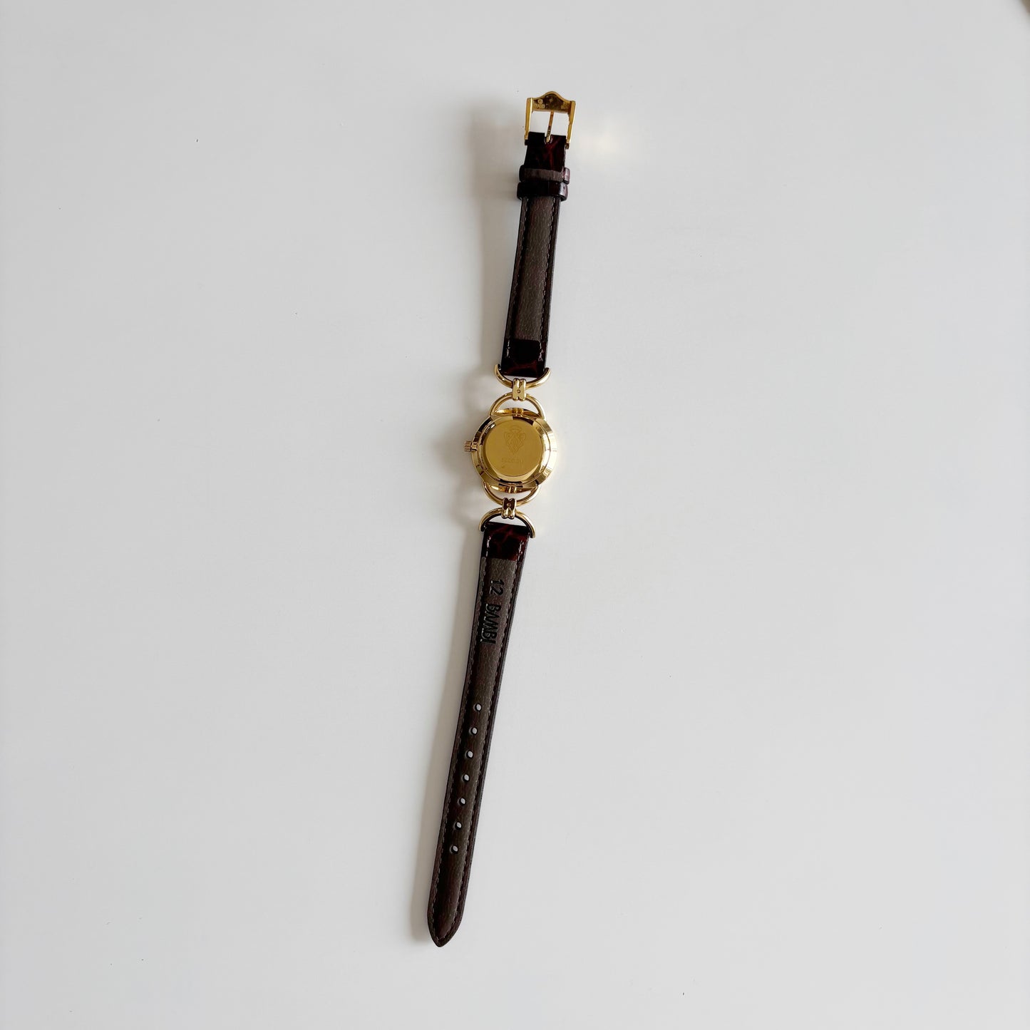 Gucci 1990s Round Dial Gold Plated Horsebit Watch