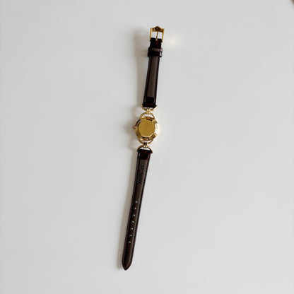 Gucci 1990s Round Dial Gold Plated Horsebit Watch