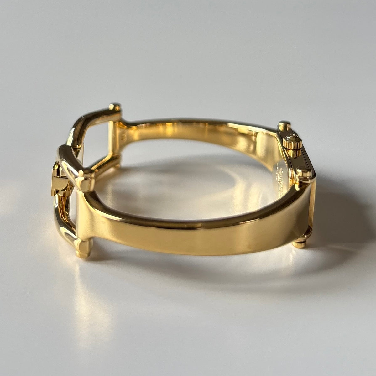 Gucci 1990s Rectangular Gold Dial Gold Plated Bangle Watch (Small)
