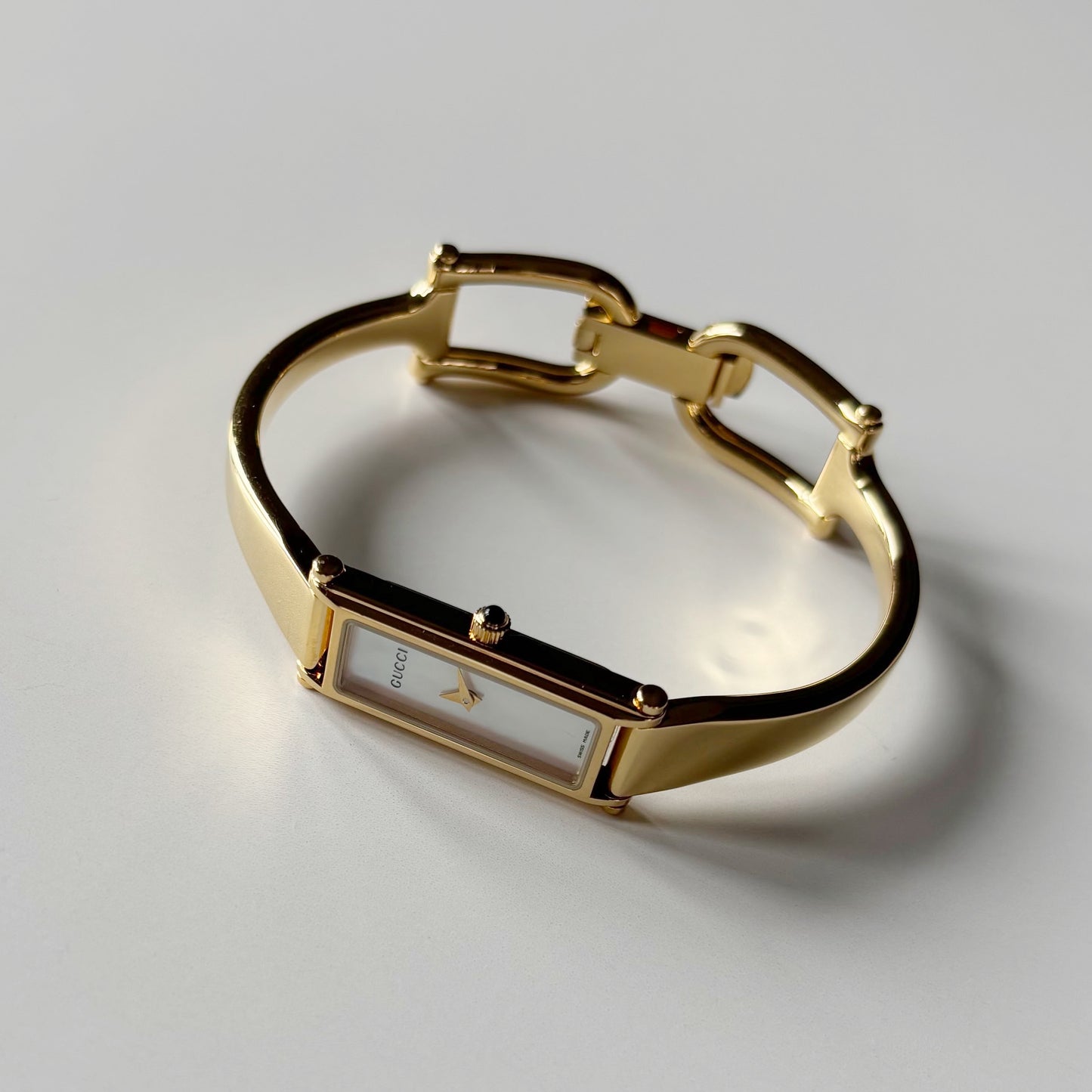Gucci 1990s Seashell Rectangular Dial Gold Plated Bangle Watch
