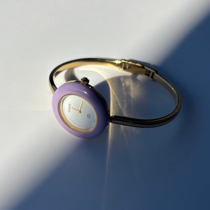 Gucci 1990s Interchangeable Bezel Gold Plated Bangle Watch with 12 bezels, case