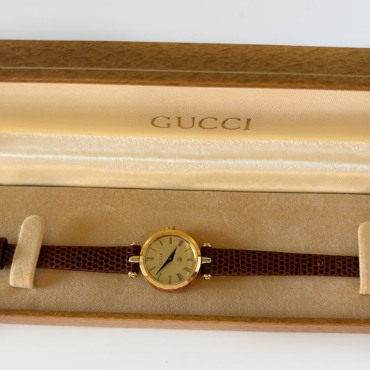 Gucci 1990s Round Gold Dial Gold Plated Watch