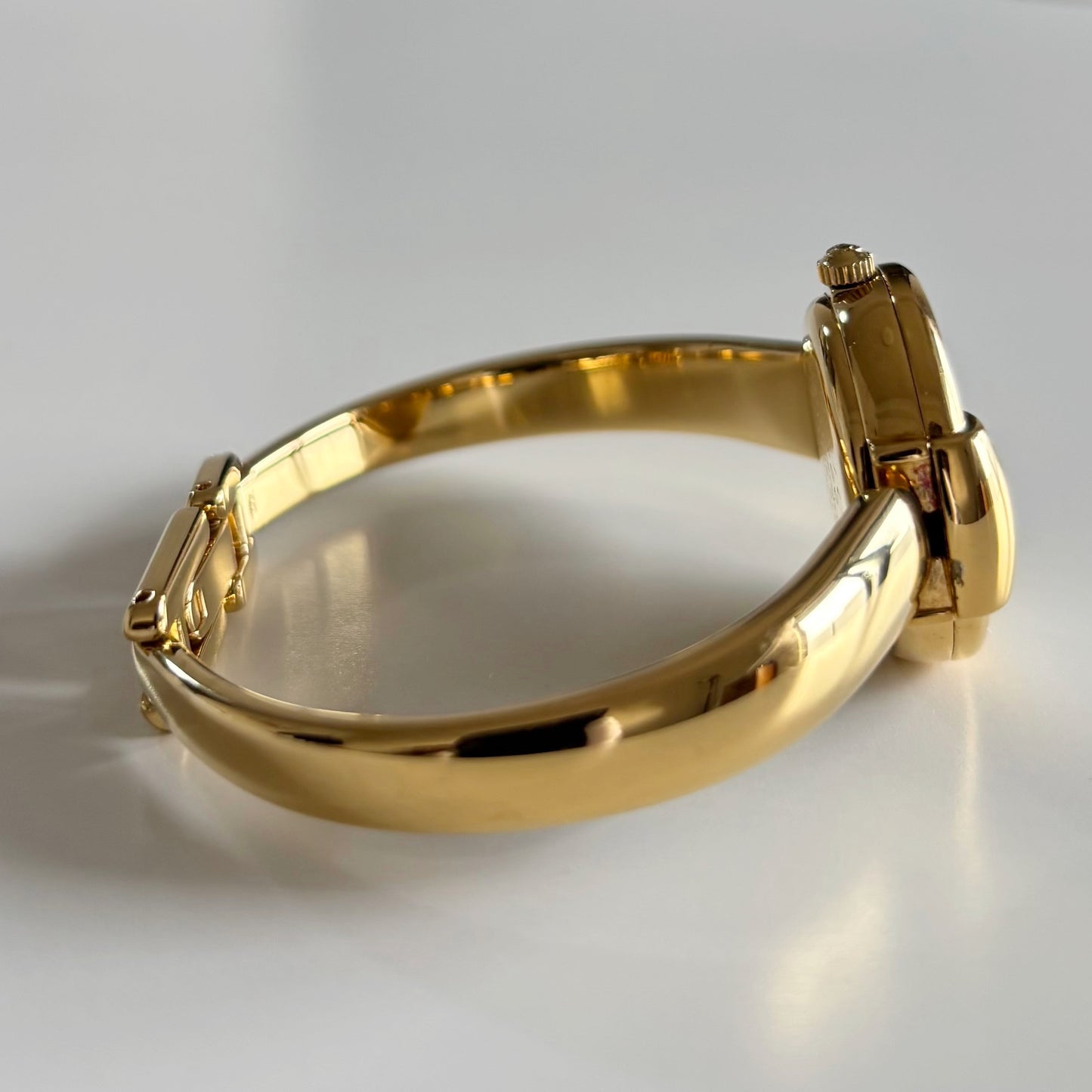 Gucci 1990s Round Dial Gold Plated Bangle Watch (Small)