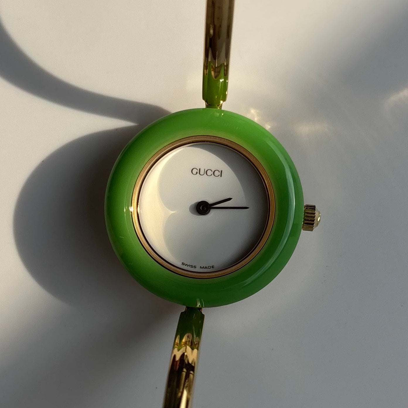 Gucci 1990s Interchangeable Bezel Gold Plated Bangle Watch with 12 bezels, case