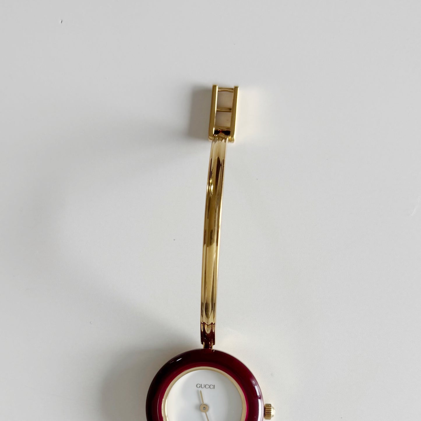 Gucci 1990s Interchangeable Bezel Gold Plated Bangle Watch with 12 bezels, case