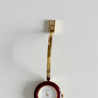 Gucci 1990s Interchangeable Bezel Gold Plated Bangle Watch with 12 bezels, case