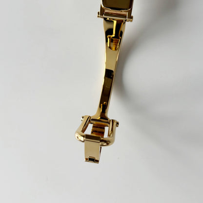 Gucci 1990s Seashell Rectangular Dial Gold Plated Bangle Watch