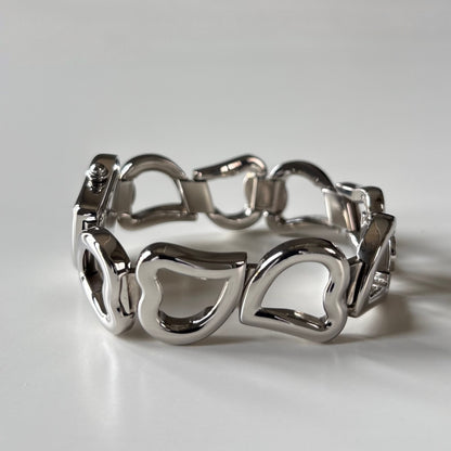 Yves Saint Laurent 1990s Heart Shaped Dial Band Silver Watch