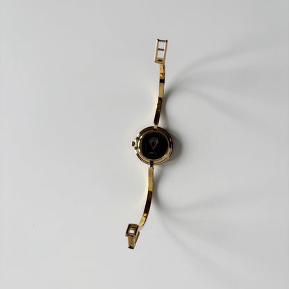 Gucci 1990s Interchangeable Bezel Gold Plated Bangle Watch with 12 bezels, case