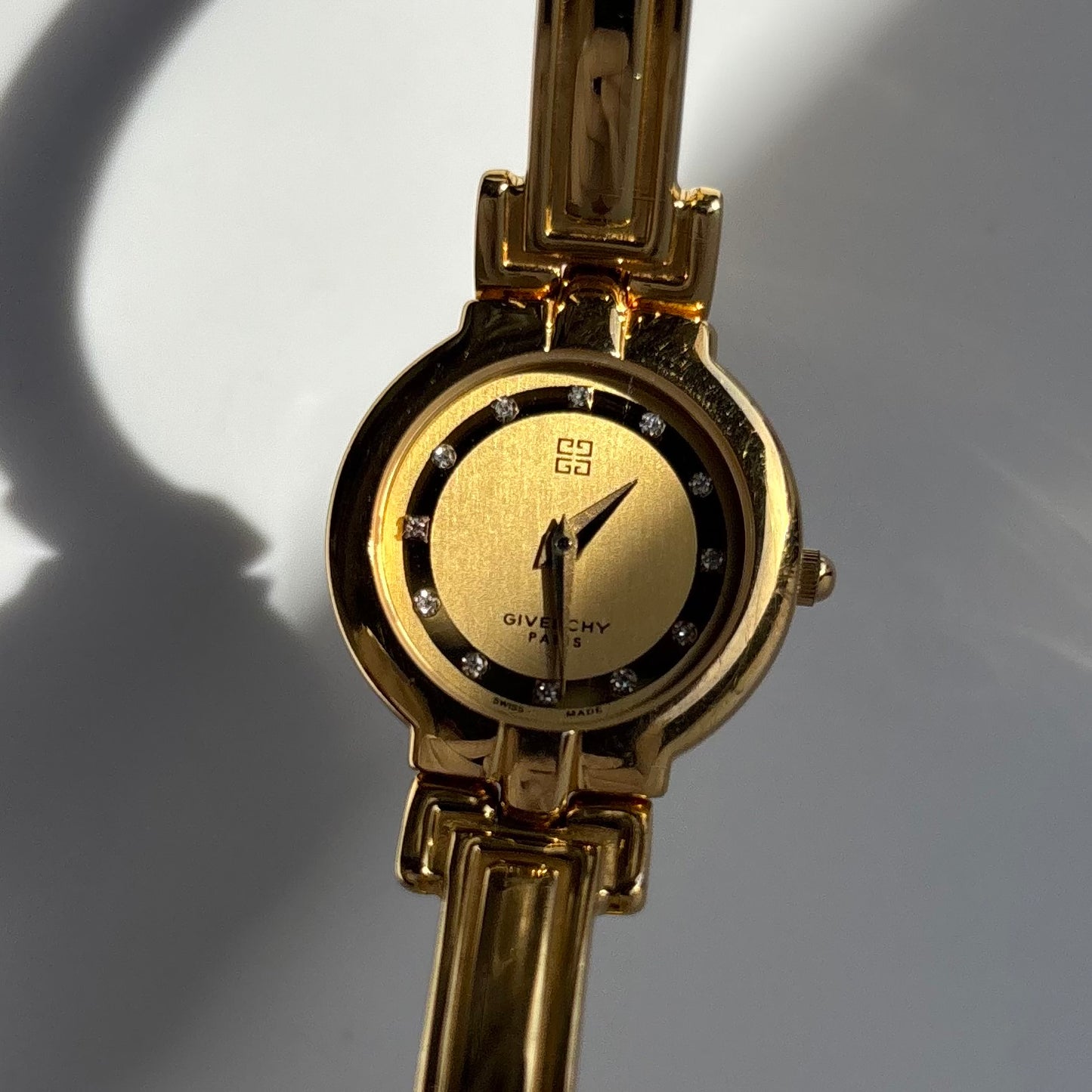 Givenchy 1990s Round Dial Gold Plated Bangle Watch