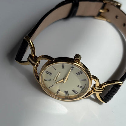 Gucci 1990s Round Dial Horsebit Gold Plated Watch
