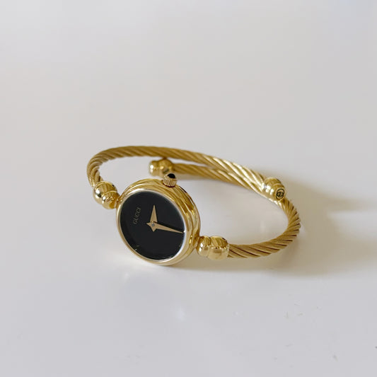 Gucci 1990s Black Dial Gold Plated Bangle Watch