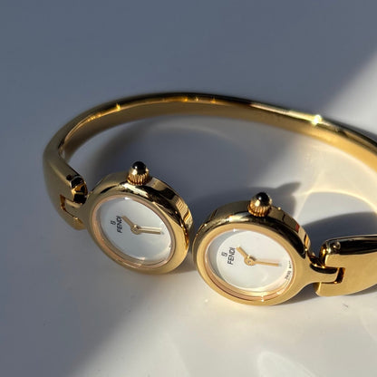 Fendi 1990s Seashell Dial Two Time Zone Gold Plated Bangle Watch