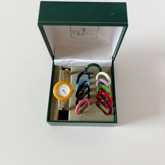 Gucci 1990s Interchangeable Bezel Gold Plated Bangle Watch with 12 bezels, case (8/30)