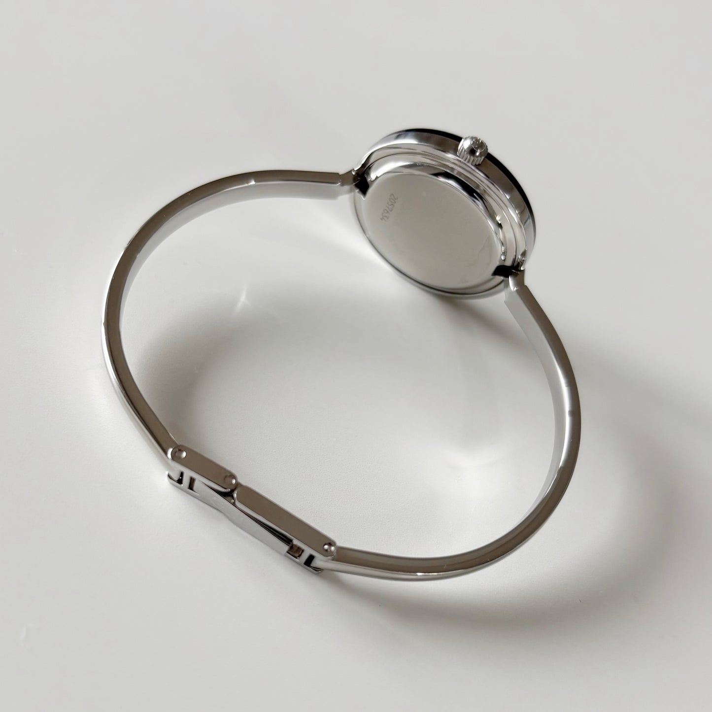 Gucci 1990s Interchangeable Bezel Stainless steel Bangle Watch with 12 bezels, case