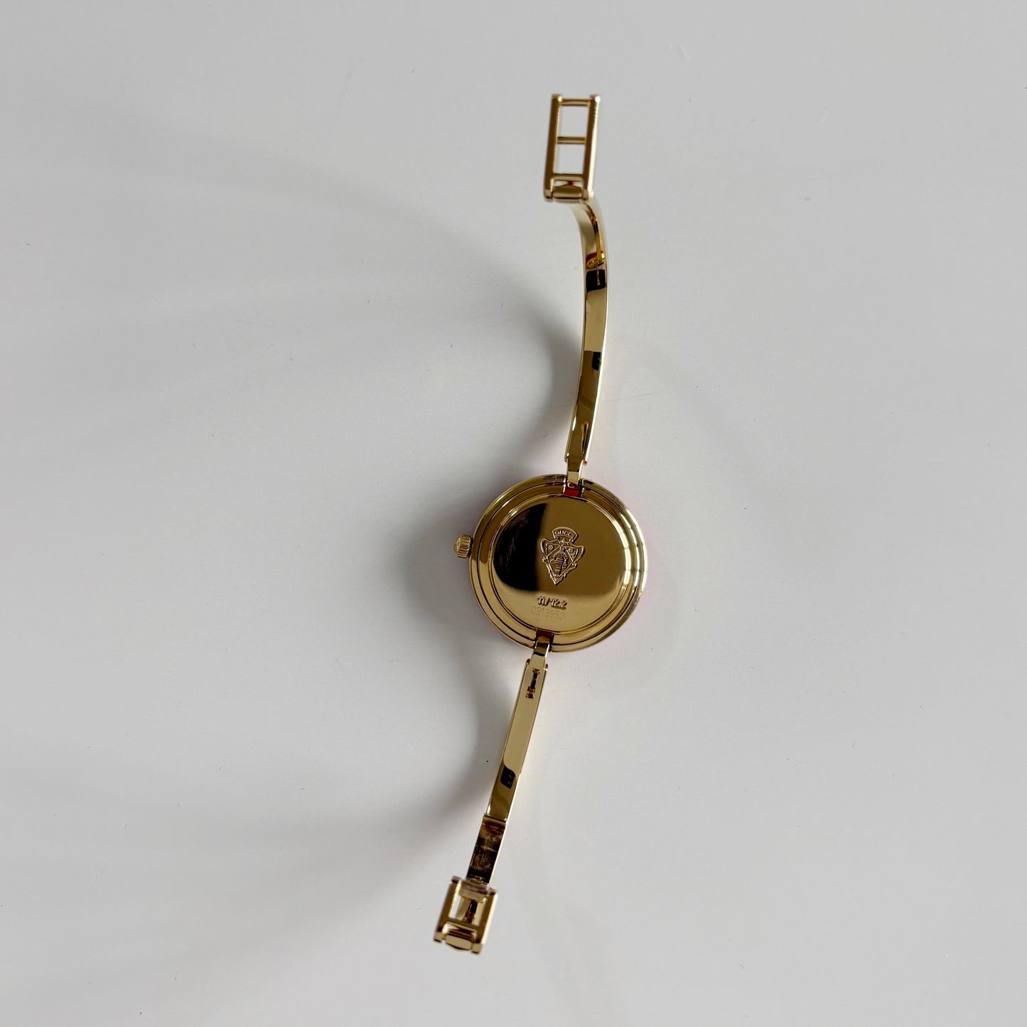 Gucci 1990s Interchangeable Bezel Gold Plated Bangle Watch with case, 12 bezels (Small)