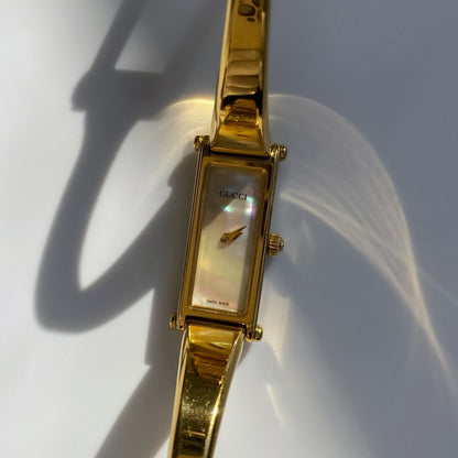 Gucci 1990s Rectangular Seashell Dial Gold Plated Bangle Watch