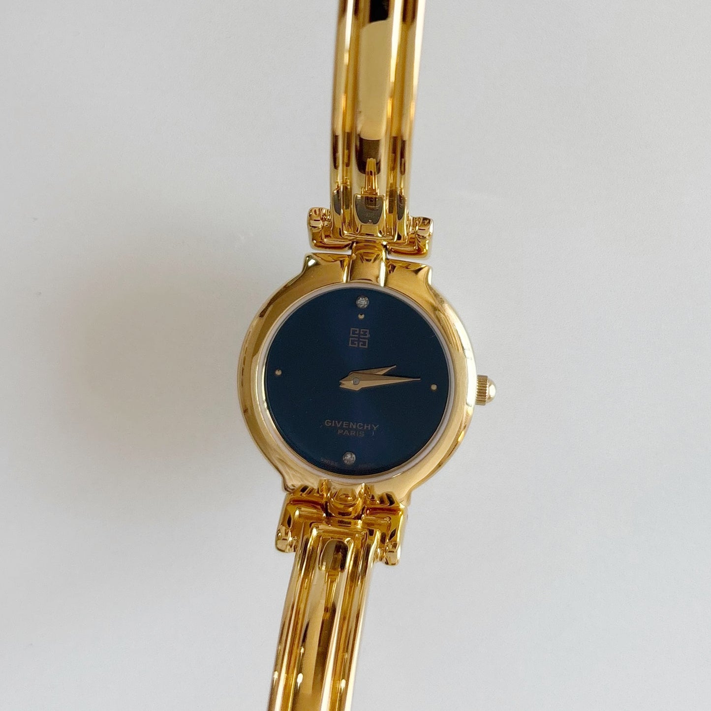 Givenchy 1990s Navy Round Dial Gold Plated Bangle Watch