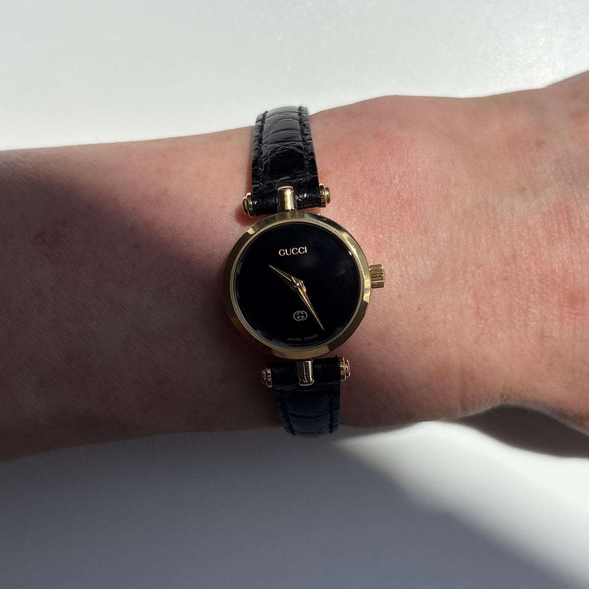 Gucci 1980s Black Dial Round Gold-Plated Watch