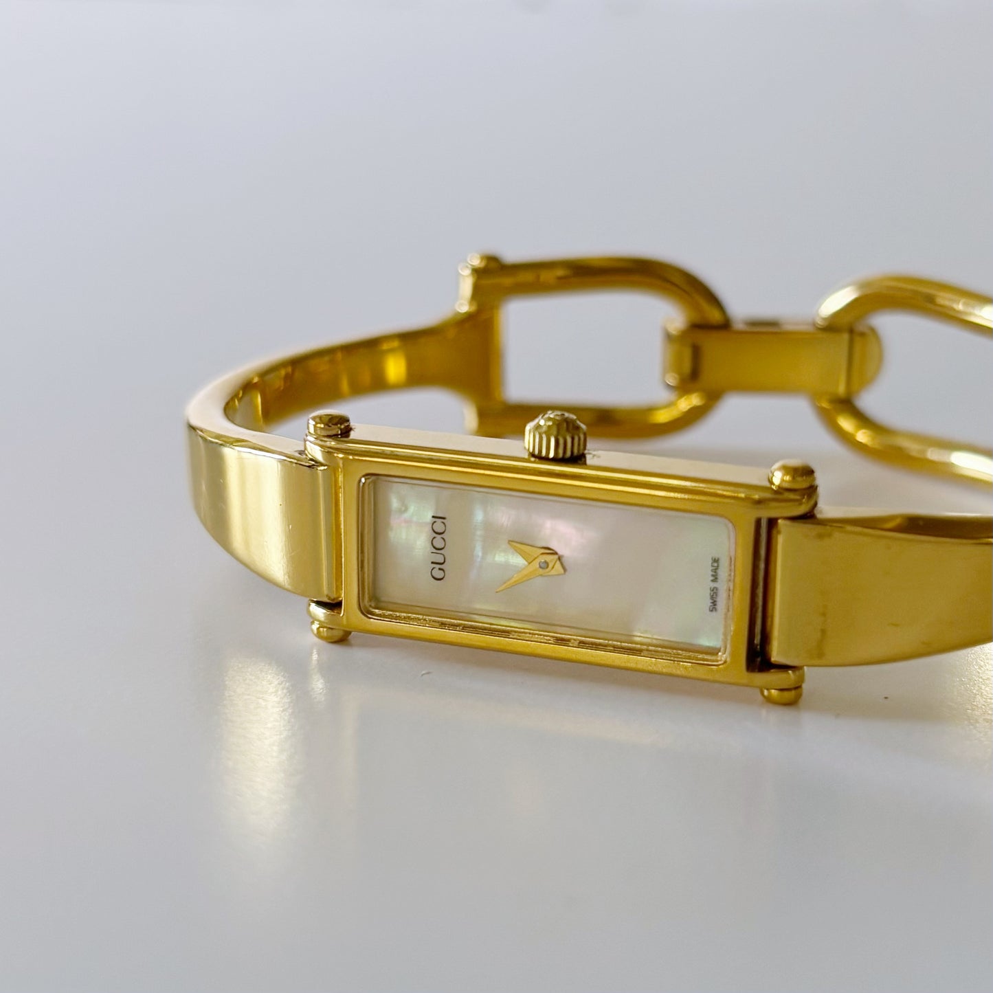 Gucci 1990s Rectangular Seashell Dial Gold Plated Bangle Watch