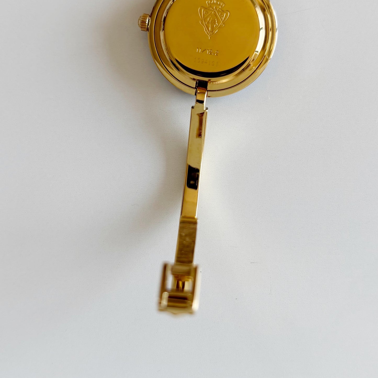 Gucci 1990s Interchangeable Bezel Gold Plated Bangle Watch with 12 bezels, case