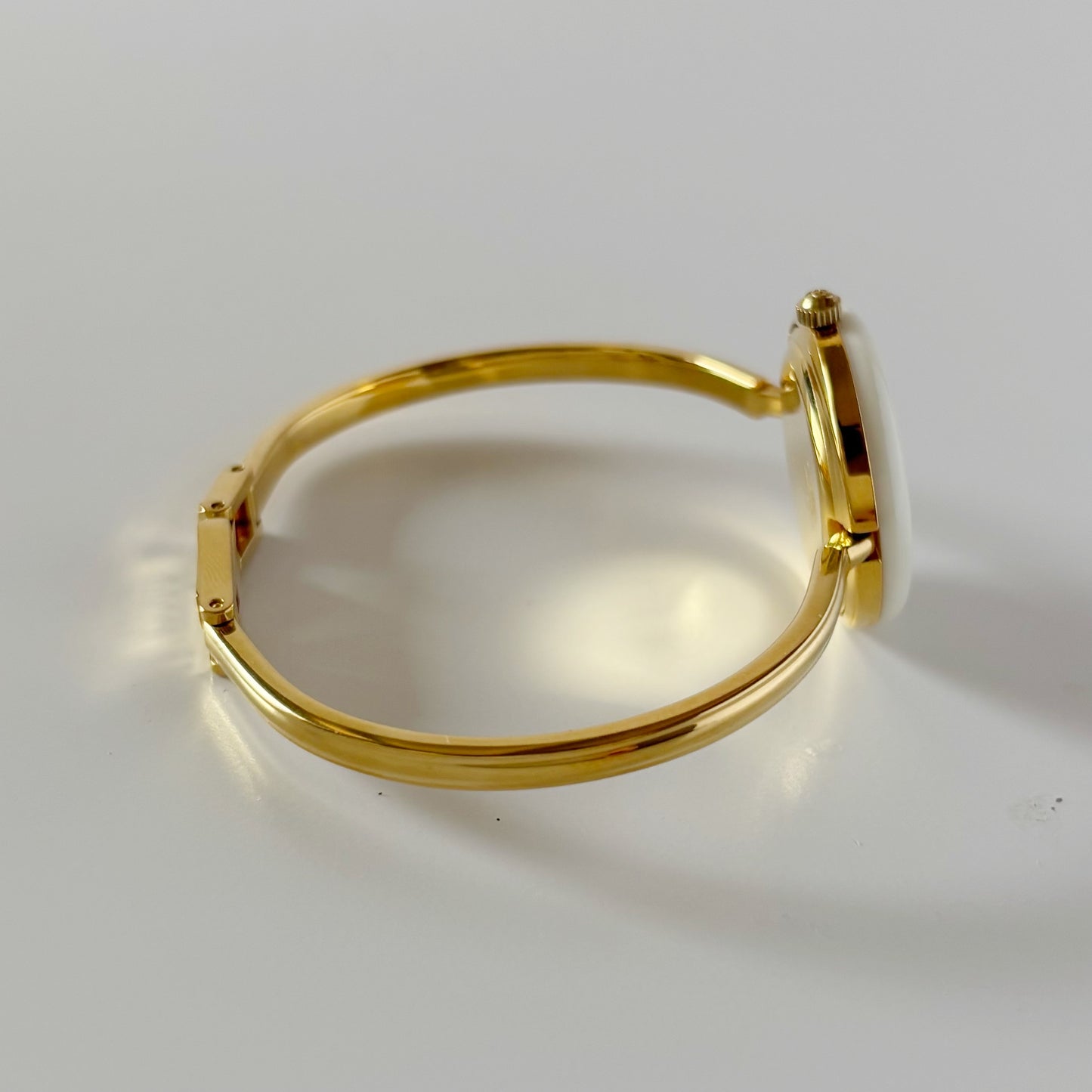 Gucci 1990s Interchangeable Bezel Gold Plated Bangle Watch with 12 bezels, case
