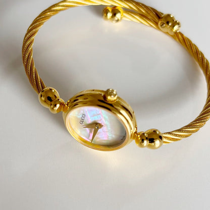 Gucci 1990s Seashell Dial Gold Plated Cable Band Bangle Watch