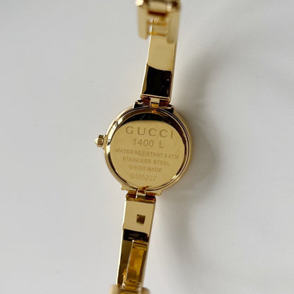 Gucci Round Dial Gold-Plated Bangle Watch