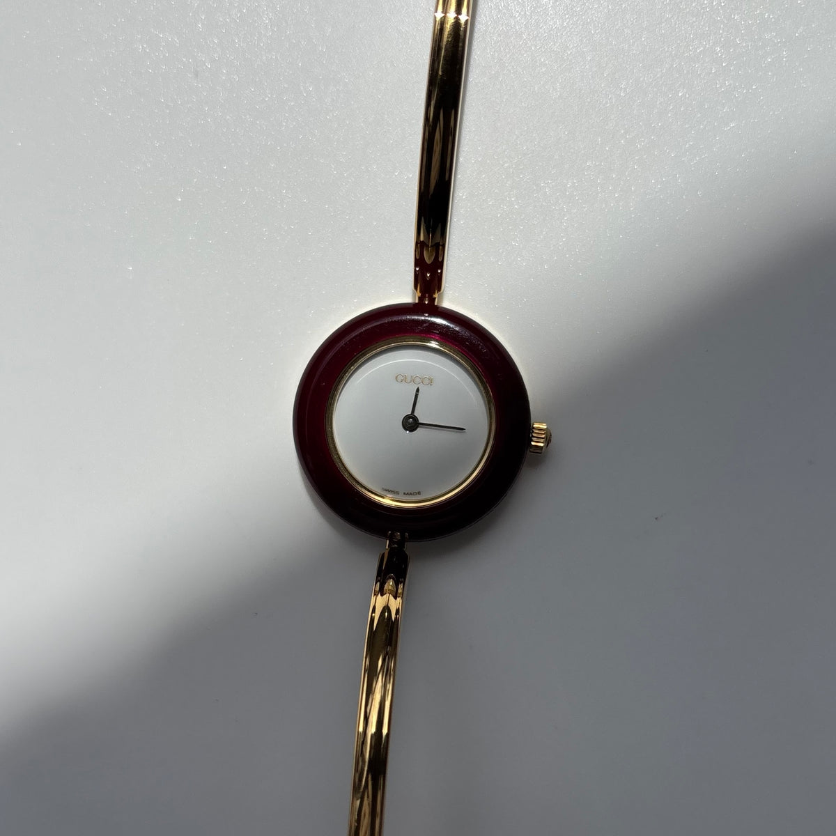 Gucci 1990s Interchangeable Bezel Gold Plated Bangle Watch with 12 bezels, case