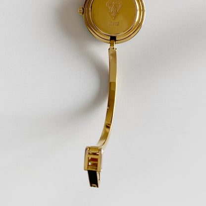 Gucci 1990s Interchangeable Bezel Gold Plated Bangle Watch with 12 bezels, case