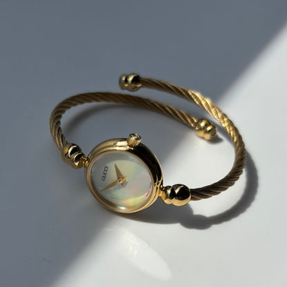 Gucci 1990s Seashell Dial Gold Plated Cable Bangle Watch