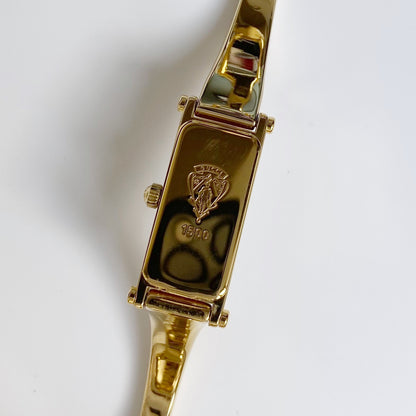 Gucci 1990s Rectangular White Dial Gold Plated Bangle Watch