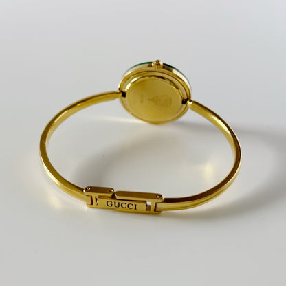 Gucci 1990s Interchangeable Bezel Gold Plated Bangle Watch with 12 bezels, case