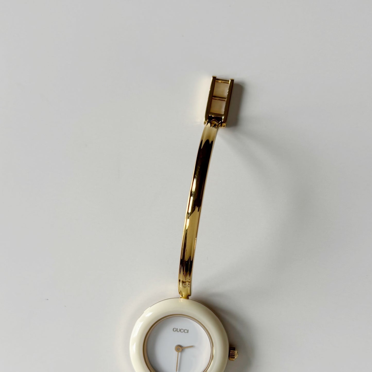 Gucci 1990s Interchangeable Bezel Gold Plated Bangle Watch with 12 bezels, case